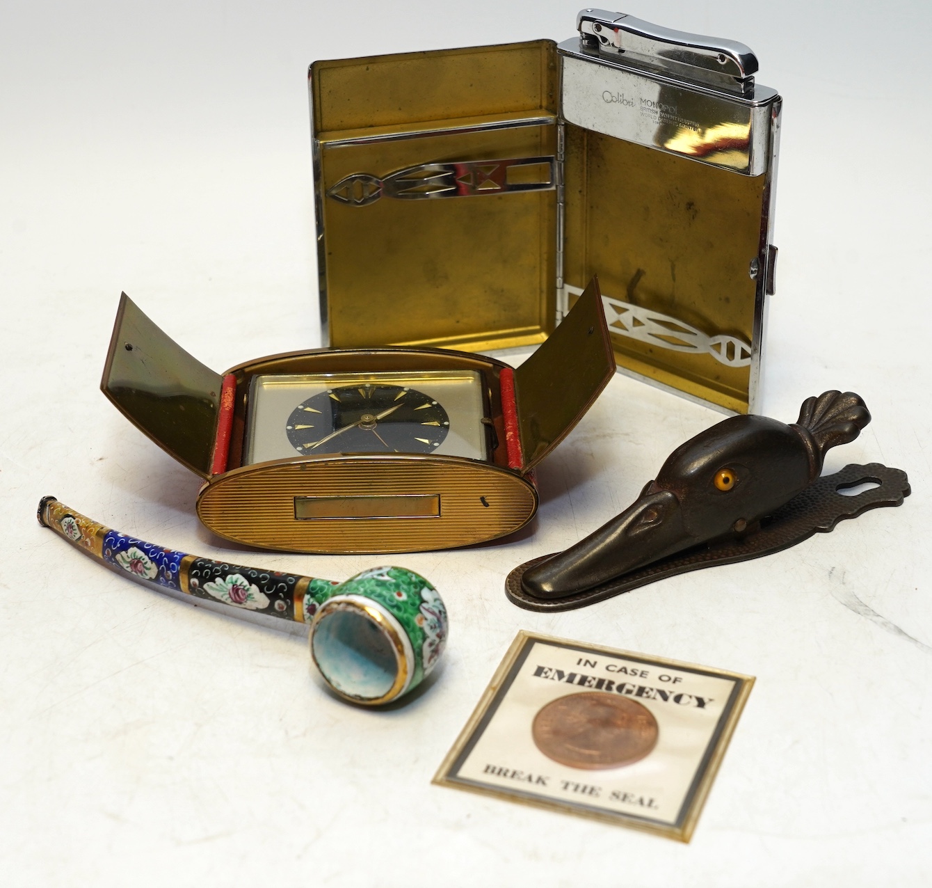 A quantity of empty jewellery boxes, a duck paper clip, a Festival of Britain commemorative coin, a cigarette case, etc. Condition - fair to good